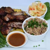 Jerk Chicken · Chicken legs quarters seasoned with Jamaican herbs and spices smoke grilled to perfection.