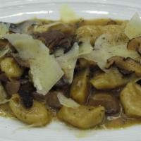Mushroom Gnocchi · Forest mushrooms, toasted garlic, sherry cream, truffle, and parmesan reggiano.