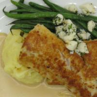 Cameron’S Walleye · Garlic mashed potatoes, Maryland crab meat, French beans, and sherry shallot cream.