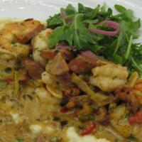 Shrimp & Grits · Tillamook cheddar, andouille sausage, and creole shrimp gravy.
