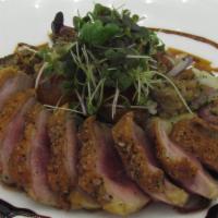 Seared Duck Breast · Confit redskin potato salad, roasted apricot, and balsamic reduction.