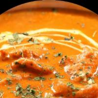 Classic Butter Chicken · Tender boneless chicken pieces grilled and sauteed in our chef's special creamy sauce.