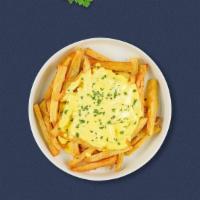 Thrill Of The Cheese Fries · Idaho potato fries cooked until golden brown and garnished with salt, melted cheddar cheese,...