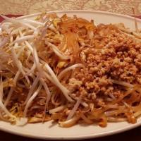 Pad Thai · Sautéed rice noodles with egg, green onions, bean sprouts, special Thai sauce, and crushed p...
