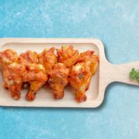 Bone-In Sky Wings (7 Pcs) · Bone-in chicken wings served with celery sticks and dressing.