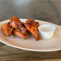 Broasted Chicken Wings · one pound (6 wings)  marinated, broasted and served plain, tossed in bbq sauce or spicy bbq ...