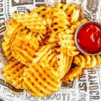 Waffle Fries · Skin-on potatoes cut in a lattice formation. served with a dash of salt.