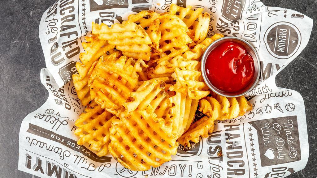 Waffle Fries · Skin-on potatoes cut in a lattice formation. served with a dash of salt.