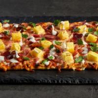 Hawaiian Flat · Aloha! Our stonefire flatbread topped with ham strips, crispy bacon, pinneapple chunks and s...