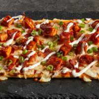 Bbq Chicken & Bacon Flat · BBQ Party! Our stonefire flatbread topped with Sweet Baby Ray BBQ chicken, crispy bacon, and...