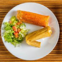 Tamal · Homemade corn masa stuffed with your choice of pork, chicken, or cheese and cactus. Our tama...