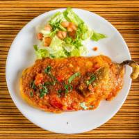 Chiles Rellenos · Cheese-stuffed poblano peppers, breaded and fried until golden.