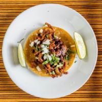 Taco Dinner · Three tacos with choice of filling, served with rice & beans.