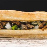 Philly Cheese Steak · Ciabatta Hoagie bread filled with 5 oz of Philly steak, grilled green peppers and onions, to...