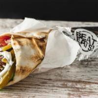 Gyro Sandwich · Greek pita bread topped with lamb meat, taziki sauce, cucumber pickles, onions, tomatoes and...