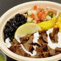 Gyro Rice Bowl · A Fresh Bowl of Rice topped with  Gyro Meat, Taziki Sauce, Sweet Corn, Diced Tomatoes and Cu...