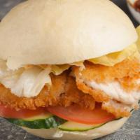 Buttermilk Fried Chicken Sandwich · Mouthwatering Buttermilk Fried Chicken served on a brioche bun with creamy coleslaw, fresh d...