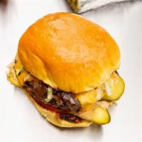 The Metro Burger · Shredded lettuce, pickle, tomato, onion jam, pump sauce.