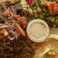 Beef Shawarma Plate
 · Includes hummus, rice with almonds, tabouli or fattoush, bread and side of garlic or tahini.