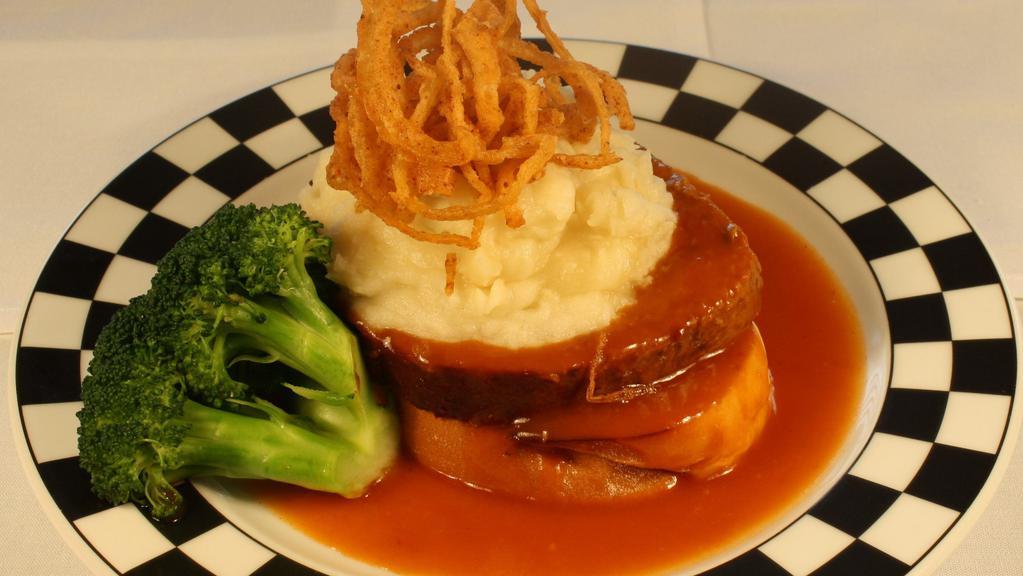 Kid'S Famous Meatloaf · Buttermilk-chive mashed potatoes, wild mushrooms, broccoli, chili onion rings, and BBQ gravy served on top of buttermilk toast.  (We apologize but meatloaf without mushrooms is unavailable).