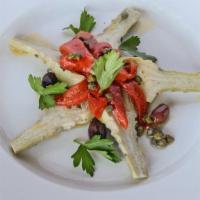 Carciofi Marinati · Whole artichoke hearts, olive oil, red peppers, and garlic.