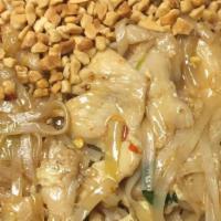 Pad Thai · Rice noodles stir fried with bean sprouts, green onion and egg in tamarind sauce garnished w...