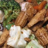 Pad Pak · Broccoli, baby corn, peapod, carrot, cabbage, and water chestnut in savory brown sauce.