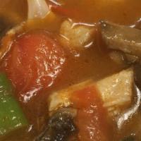 Tom Yum · Thai soup flavored with lemon grass and lime leaf, mushroom, tomato and green onion.