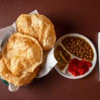 Halwa Puri · 3 Pieces Puri with Halwa Chana Aloo Bhujia.