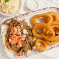 Gyro Sandwich · Zesty gyro piled on pita bread with tomato and onion, served with tzatziki sauce, Served wit...