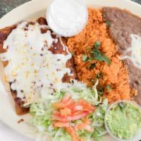 Enchilada'S · 3 Enchiladas served with Rice and Beans.