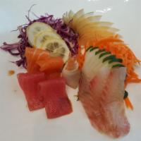 Sashimi Appetizer (9) · Nine (9) pieces of assorted raw fish.