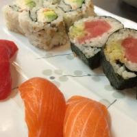 Sushi Combo 4 · 2 pc tuna nigiri, 2 pc salmon nigiri, 4 pc of california roll, 3 pc of spicy tuna roll.