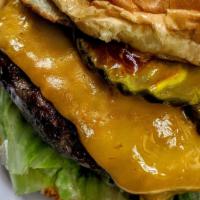 Cheeseburger · Fresh, never frozen black angus steak burgers 1/3 lb. with onions, tomato, lettuce, mustard,...