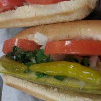Hot Dog · 100% Vienna beef. Served Chicago style- mustard, onion, relish, tomato, pickle, sport pepper...