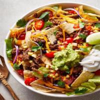 Taco Salad · Lettuce, tomato, sour cream, cheese, guacamole, and  meat.