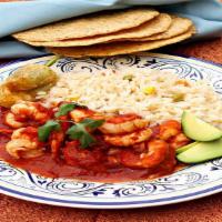 Camarones A La Diabla · Sauteed shrimp in butter and hot sauce. Served with tortillas, rice, and salad.