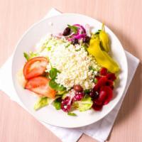 Sero'S Greek Salad · mixed greens, tomatoes, crumbled feta and beets, pepperoncinis, onions and sero's special dr...