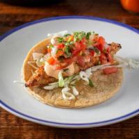 Fish Tacos · 3 grilled mahi mahi tacos with cabbage, chipotle lime crema, pico de gallo. served with rice...