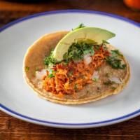 Chicken Tinga Tacos · 3 braised chicken tacos served with onion, cilantro, avocado. Comes with shredded cheese, le...