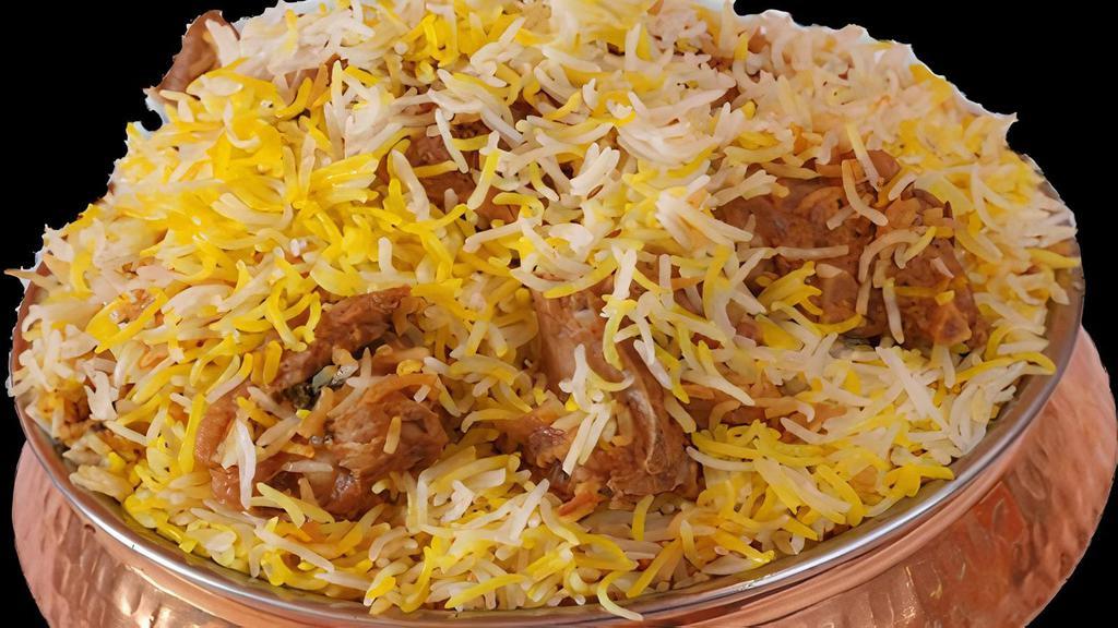 Chicken Biriyani · Classic dish of curried rice with chicken & vegetables.
