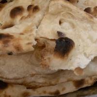Plain Naan · Plain unleavened bread made in Tandoor.