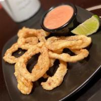 Crispy Calamari · Squid rings seasoned and deep fried.