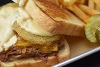 Short Rib Grilled Cheese · Short rib, Cheddar, Smoked Gouda, fried green tomatoes, caramelized onions.

Served with nat...