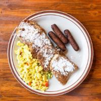 Vegan Union Pacific Style French Toast · Two thick pieces of ciabatta bread sprinkled with powdered sugar and cinnamon. Tofu scramble...