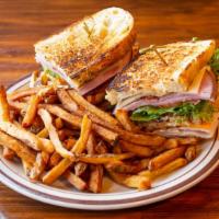 Dagwood Club · Ham, Turkey, Bacon, Swiss, Cheddar, Lettuce, Tomato & House Dressing, stacked up with 3 piec...
