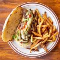 Vegan Billy'S Cheese Steak Sandwich · Sauteed Vegan Steak with Red & Green Peppers, Onion & house-made Vegan Cheese Sauce on a toa...