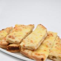 Famous Cheesy Breadsticks · Our Famous Mozzarella Cheesy Bread Buttered with Parmesan and Garlic Salt.