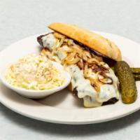 Skirt Steak Sandwich · Topped with grilled onions and mozzarella cheese on a french roll.