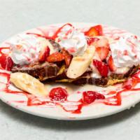 Jojo'S French Toast · Our homemade banana bread french toast topped with mascarpone cheese spread, strawberries an...